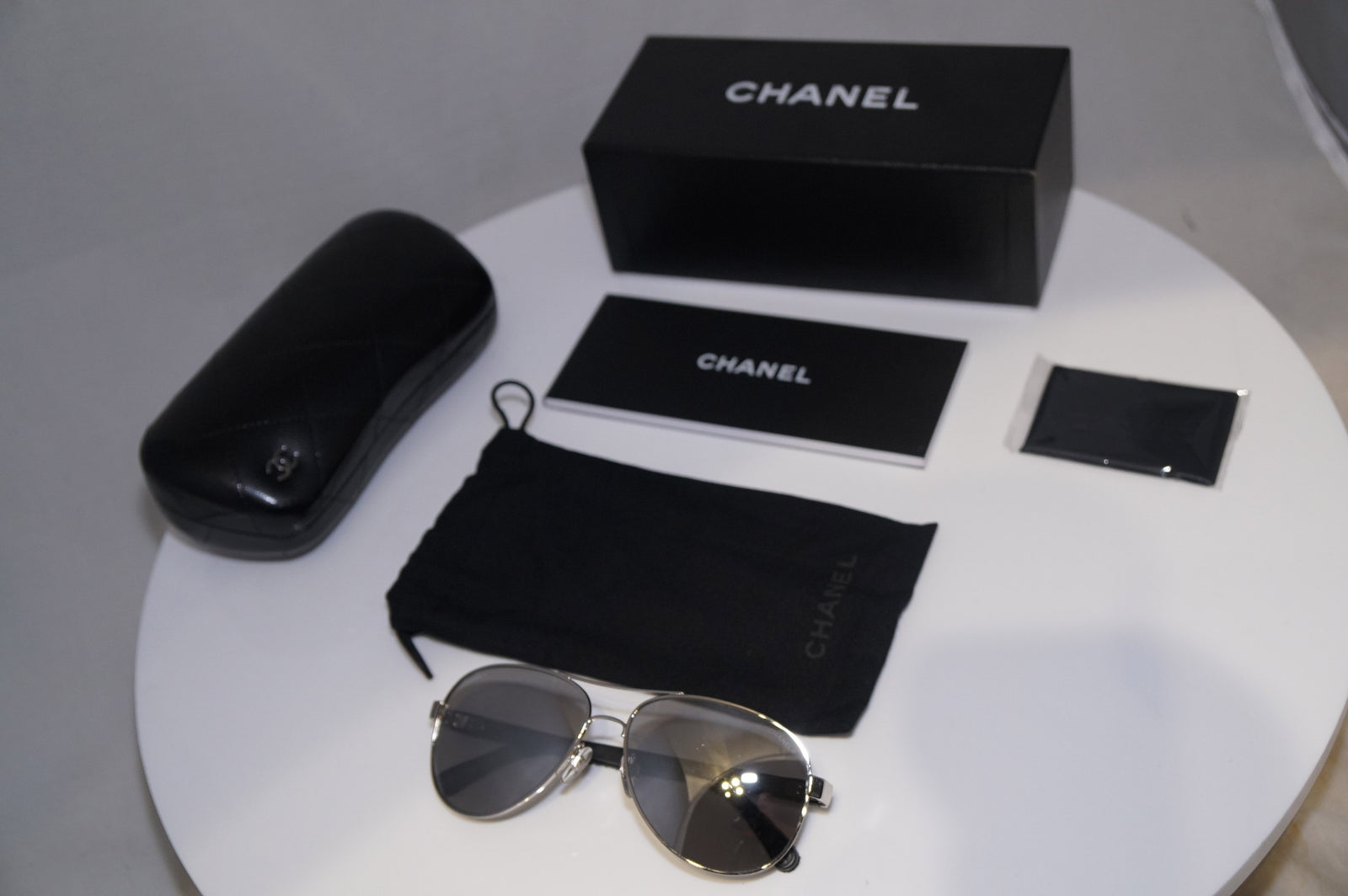 Chanel Silver Mirrored Round Sunglasses Labellov Buy and Sell