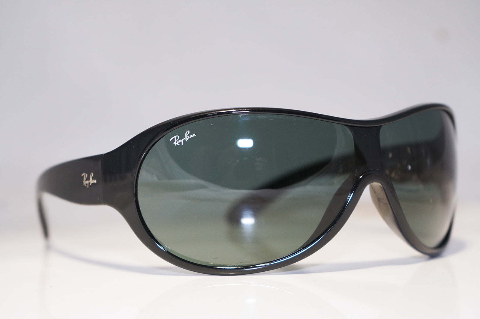 Ray-Ban ブラックフレーム RAY-BAN Mens Unisex Designer Sunglasses Black Wrap RB 4081 601/71