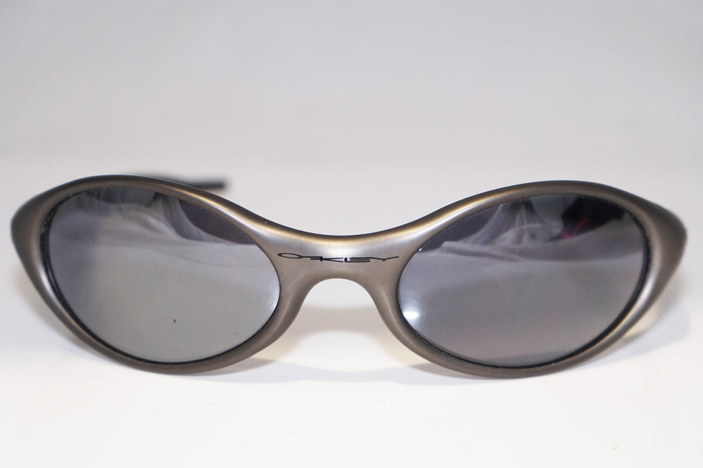 OAKLEY Vintage Mens Designer Sunglasses Silver Wrap Jacket SLV 14798